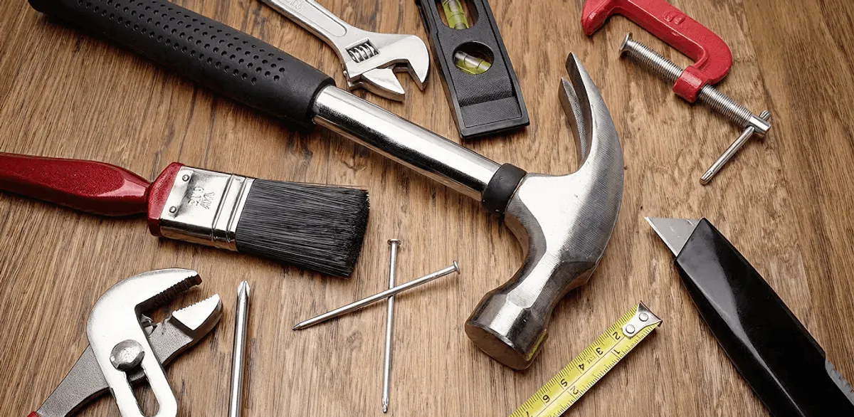 Handyman tools laid out for home repair and maintenance work in Nashua, NH
